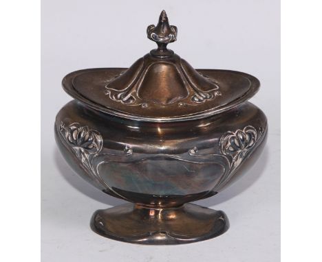 An Art Nouveau silver bombe shaped tea caddy, embossed with stylised flowers on whiplash stems, hinged cover, pedestal foot, 