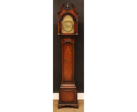 A George III style oak dwarf longcase clock, 20cm arched brass dial with Roman and subsidiary Arabic numerals, the arch with 