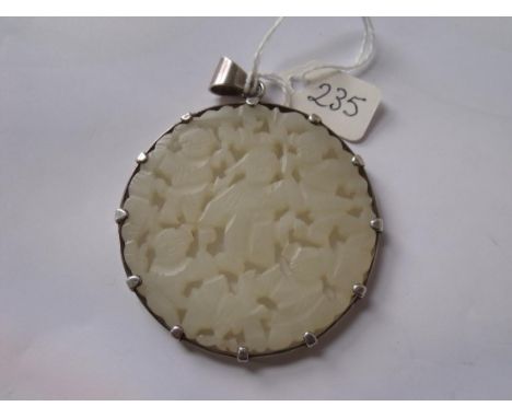 Large circular 5.5cm dia white jade pendant in silver   mount 28g inc       