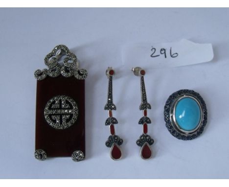 Two silver pendants and a pair of earrings    
