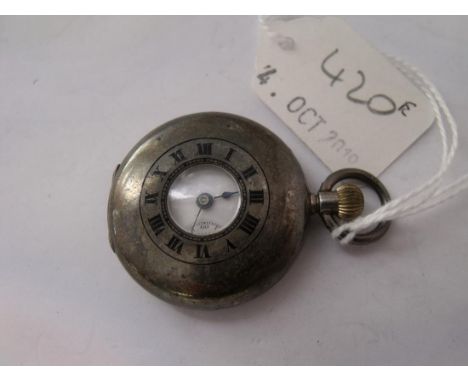 A small silver half hunter fob watch     
