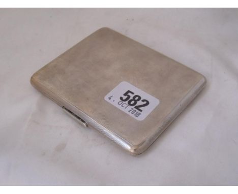 A heavy cigarette case, engine turned 4” long  Lon 1936 170g.       