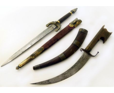 Two daggers, one with bronze enamel sheath Conditions reports are not available for our Interiors Sale.