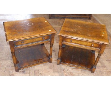 A pair of oak Cumper lamp tables with drawers 61cm X 47cm Conditions reports are not available for our Interiors Sale.