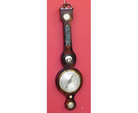 A rosewood wheel barometer, missing its thermometer, with silvered forecasting dial. Conditions reports are not available for
