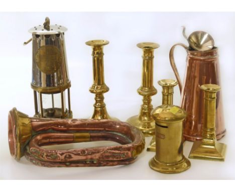 Two pairs of brass candlesticks, copper enamel lined pot, A.T.C. copper/brass bugle and Protector miners lamp. Conditions rep