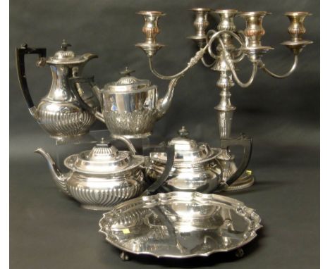 Plated Mappin & Webb tea pot, two similar tea pots, plated coffee pot and five branch candelabra and tray. Conditions reports