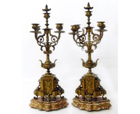 A pair of bronze column candelabras Conditions reports are not available for our Interiors Sale.