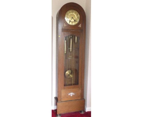 Early 20th century oak triple weight hall clock. Conditions reports are not available for our Interiors Sale.