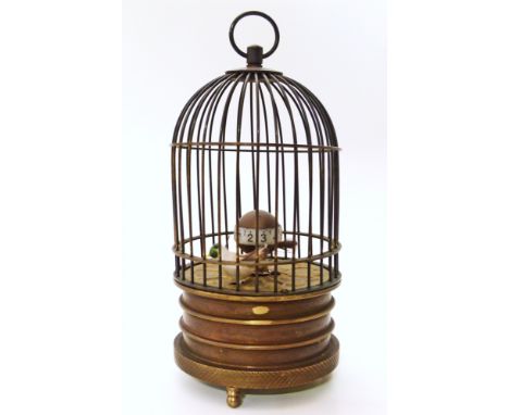 Brass bird automator clock with wind up movement Conditions reports are not available for our Interiors Sale.
