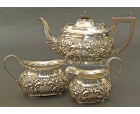 Silver embossed three piece tea service Conditions reports are not available for our Interiors Sale.
