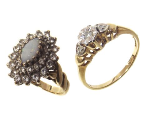 A 9ct gold opal set ladies' dress ring, and a small 9ct gold dress ring set with white stones Conditions reports are not avai