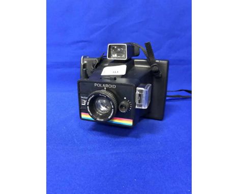 LOT OF CAMERASincluding some modern and some vintage examples, polaroids and film examples, along with lens covers and filter