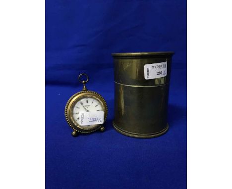 TWO TRENCH ART CANDLESTICKS, TRENCH ART PAPERWEIGHT, PAIR OF EASTERN VASES AND A SMALL MANTEL CLOCK 