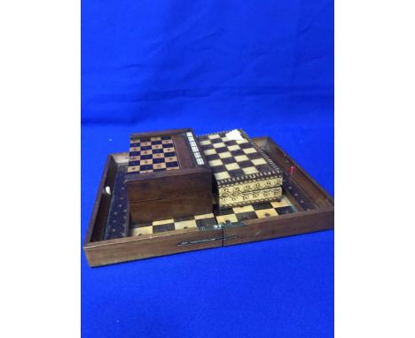 THREE VICTORIAN TRAVELLING CHESS, BACKGAMMON AND DOMINOES BOXES