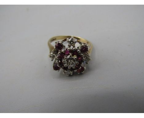 9ct gold floral cluster ring with red and white stones 3.22 gms size M