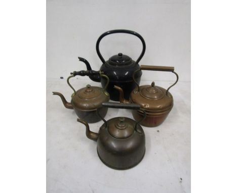 3 copper and one black enamel kettle