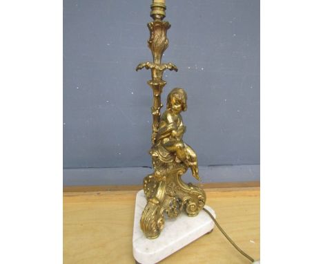 A brass lamp base with a seated cherub- loose