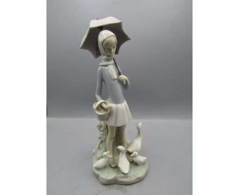 Lladro girl with geese, repair to gooses neck and chip on beak