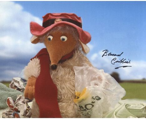 The Wombles. 8x10 photo signed by actor Bernard Cribbins who was narrator for the series. Good condition. All autographs come