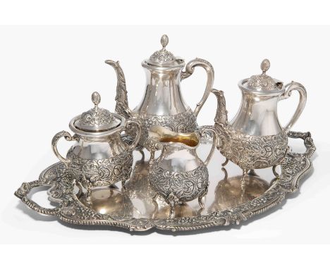 Kaffee-/Teeservice, Anfang 20.Jh.Silber, teilvergoldet. 5-teilig. Gemarkt SK. Birnförmiger Korpus auf Volutenfüssen, gewölbte