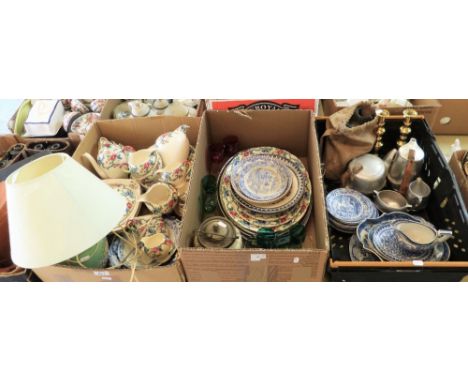 Three boxes of miscellaneous including Picquot ware tea service, a pair of Victorian candlesticks, 1940s gas mask, a blue and