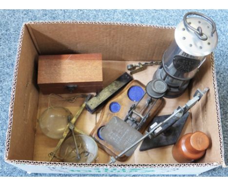 A miner's lamp, a set of postal scales, two sets of sovereign scales and two other sets of scales, cased set of weights etc.
