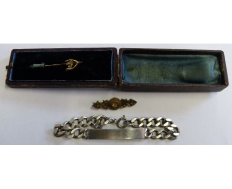 A 15ct gold bar brooch, a silver ID bracelet and a boxed stick pin