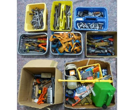 Seven boxes of miscellaneous tools, spanners, saw, socket set,fixing straps etc.