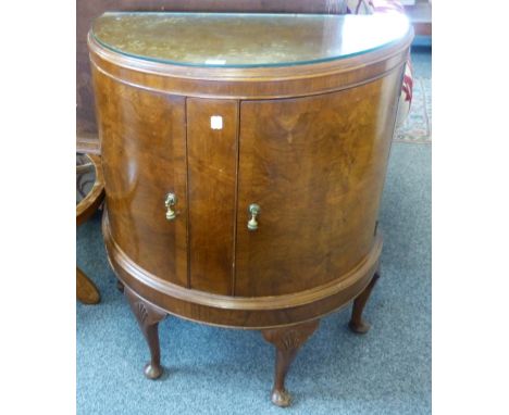 A walnut half round cocktail cabinet with cabriole legs 78cm wide and a large oak framed machined tapestry picture 180cm wide