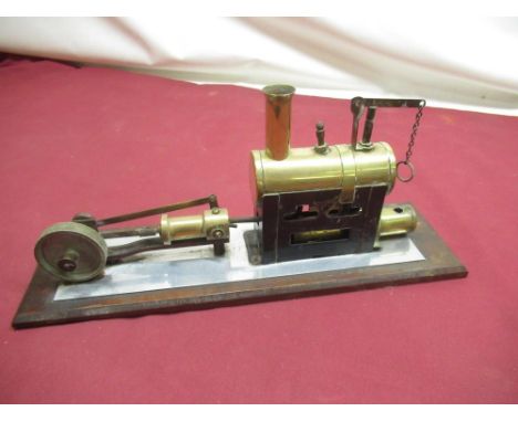 1950's apprentice made single cylinder stationary engine with brass boiler, brass spirit burner and cylinder on shaped presen