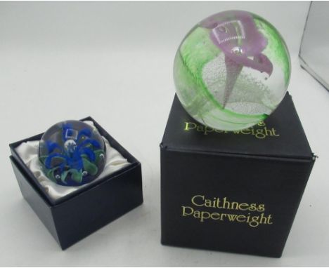 Boxed Caithness Calypso Pink glass paperweight, numbered U8841 and a boxed Kenley's "Vortex Miner" glass paperweight (2) 