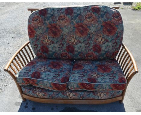 Ercol Renaissance three piece suite and stool, with floral loose back and seat and arm cushions, W128cm D83cm H93cm max (4) 