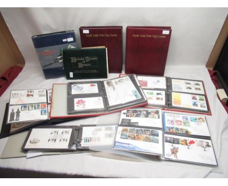 Nine folders of First Day Covers 