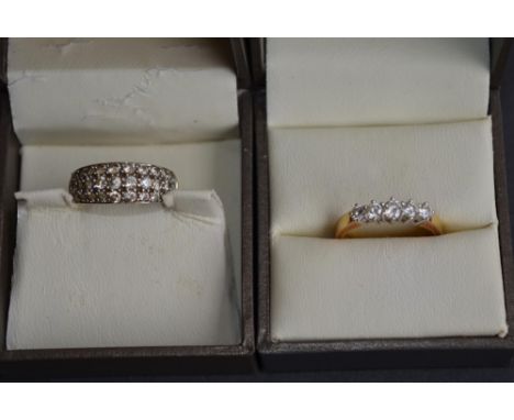 2 rings by Goldsmiths: An 18ct yellow gold ring set with 5 brilliant cut diamonds, stamped 750, size L (3.6g) and a 9ct yello