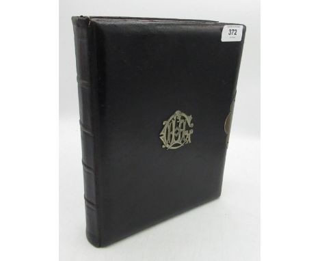 Late Victorian monogrammed photograph album containing carte de visite and cabinet cards, three quarter length portrait, fami