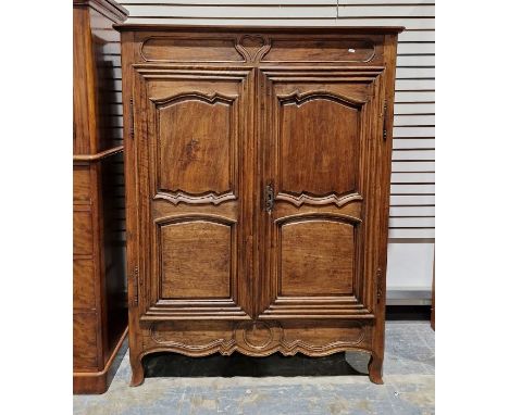French fruitwood armoire enclosed by two shaped panel doors enclosing shelves, 157cm high x 120cm wide x 53cm deepCondition R
