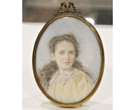 Late 19th century school,Watercolour on ivory,A portrait miniature of a young lady, signed Nina Champton and dated 1897 lower