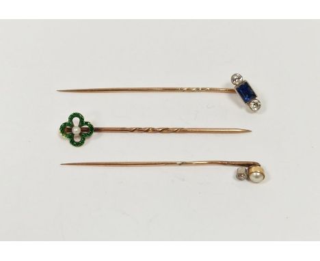 Antique gold-coloured metal, sapphire and diamond stickpin&nbsp;set rectangular sapphire flanked by two diamonds, a gold-colo