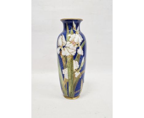 Doulton Burslem blue scale pattern ground oviform vase, decorated with irises outlined in gilding, signed by J A Phillipps, c