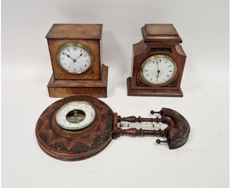 Two Edwardian mantel clocks, the first oak cased in rectangular section case with white enamel dial, the second in mahogany c