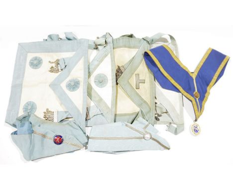 Collection of Masonic aprons and collars, mid 20th century, white kid leather edged in pale blue watered silk and mounted in 
