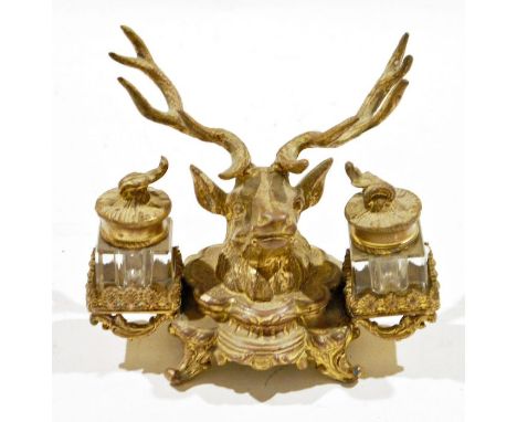 19th century gilt metal mounted double inkwell&nbsp;cast as a stag's head flanking two square section cut glass inkwells, wit