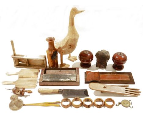 Assorted items of treen&nbsp;including a yew wood vase by William Stanley, 1991, assorted napkin rings, a model duck, a vinta