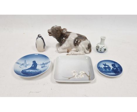 Group of Royal Copenhagen porcelain, 20th century, printed marks, comprising a model of a recumbent cow, model no.1072, 16cm 