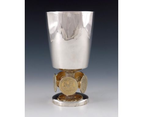 Stuart Devlin, a Modernist silver and parcel gilt Bristol 600 Goblet, London 1974, the plain conical bowl on a bark textured 