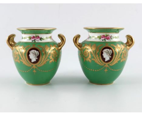 A pair of Minton vases, twin handled shouldered ovoid form, painted with portrait medallions within tooled gilt roundels, bet