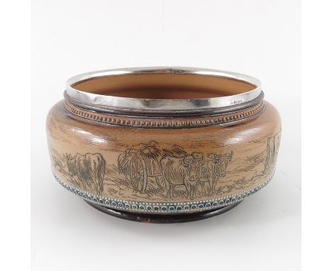 Hannah Barlow for Doulton Lambeth, a stoneware bowl, 1880, squat rounded cylindrical form, sgrafitto decorated with farmer an