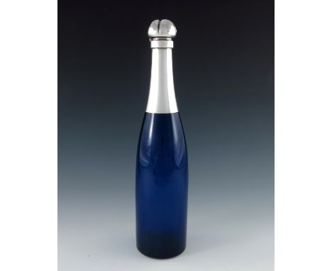 A Victorian novelty silver and glass decanter, Hukin and Heath, Birmingham 1895, modelled as a Champagne bottle, the blue gla