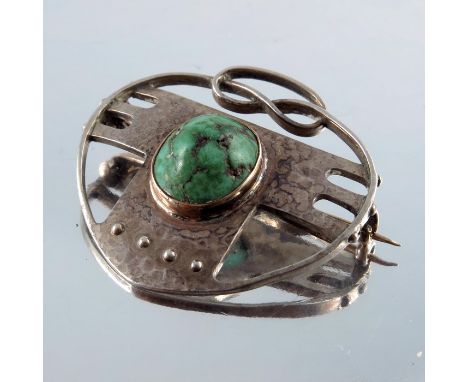 Murrle Bennett and Co., an Arts and Crafts silver and turquoise brooch, in the Secessionist style, the central cabochon set w